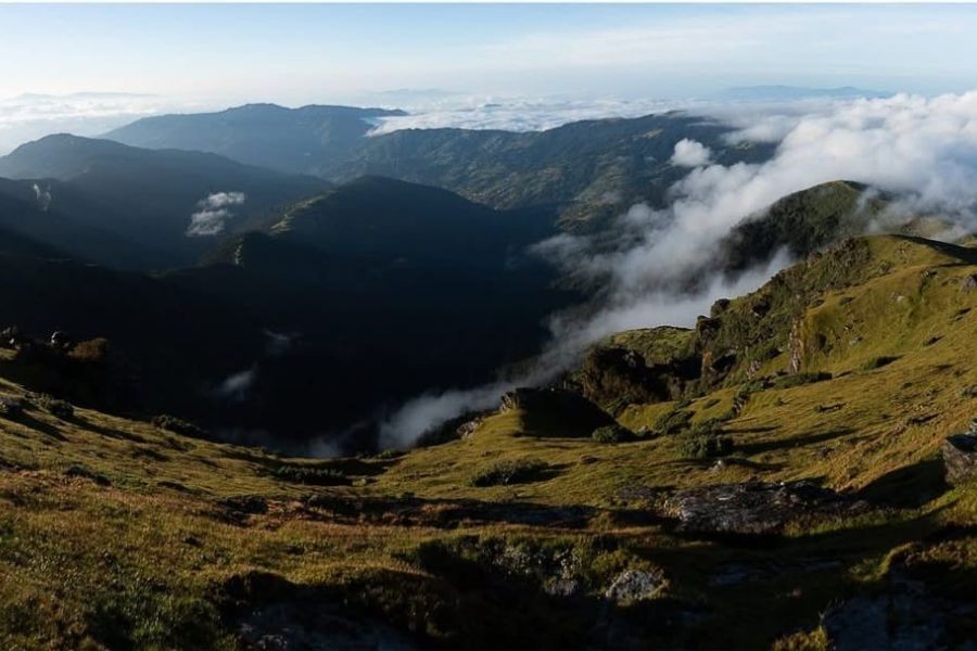 Clouds rolling over Pikey Peak’s summer landscape